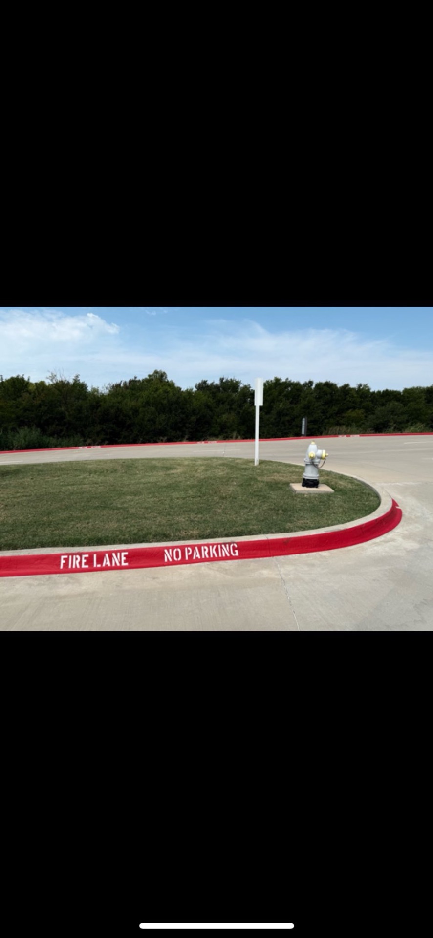 Red fire lane no parking curb striping